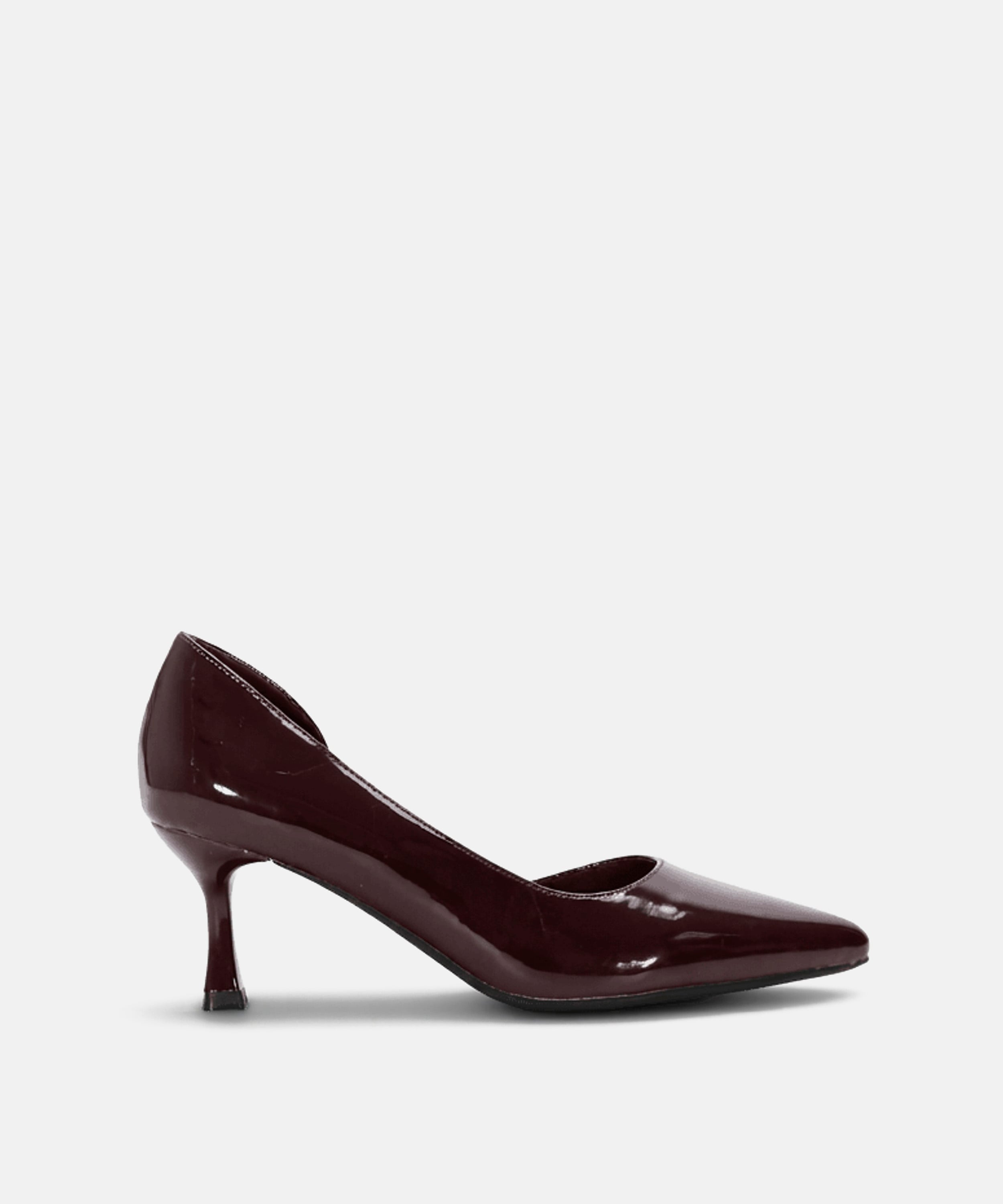 Zapato tac&oacute;n asim&eacute;trico  